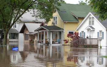 Flooded street and houses in Cedar Rapids, Iowa
